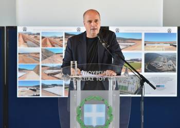 Andreas Dracopoulos, President of the Stavros Niarchos Foundation, at the podium of the Ministry of Citizen Protection, makes a speech